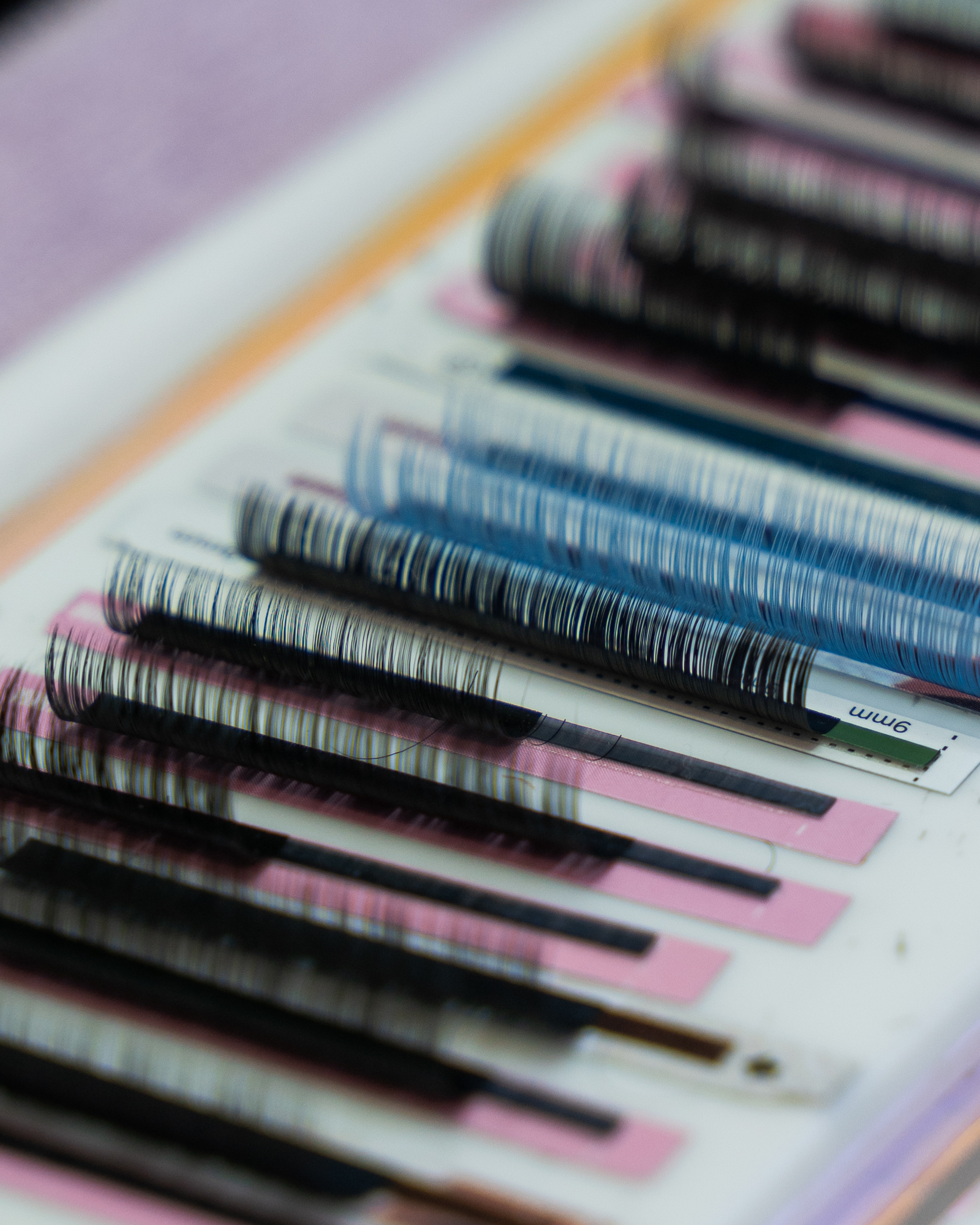 Blue and black lash tile
