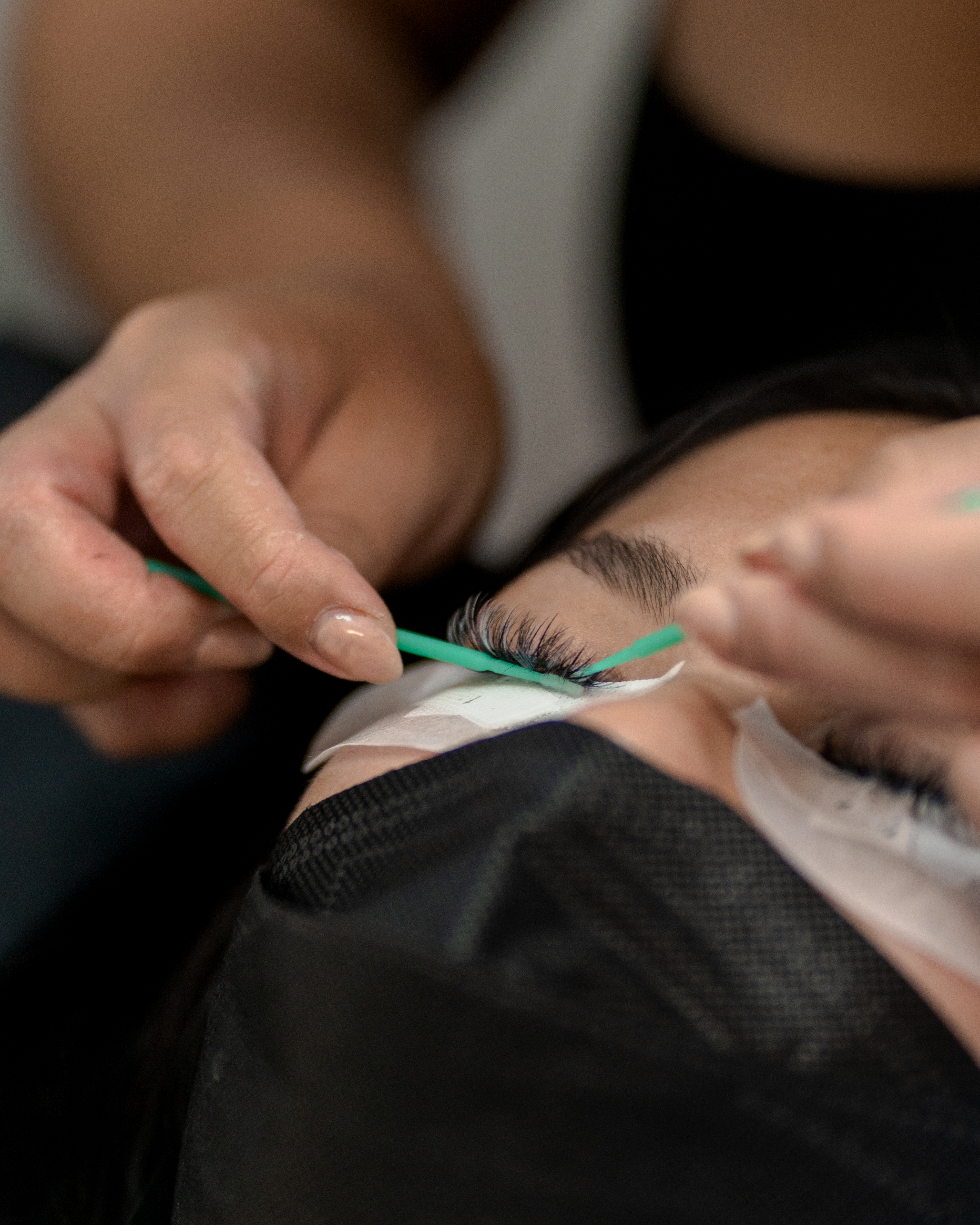 Applying superbonder to lashes